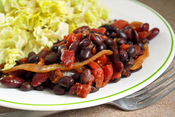 Nutritious vegetarian chili with a fresh garden salad
