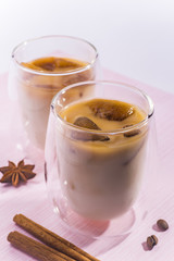 Closeup of spiced milk with coffee ice cubes
