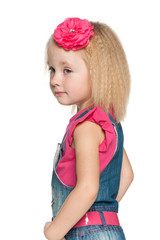 Profile portrait of a pensive little girl