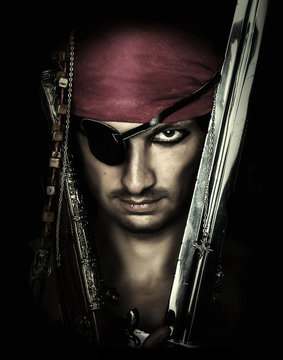 handsome male pirate holding sword