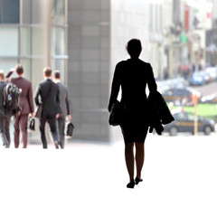 Fototapeta premium Business woman walking on the street.