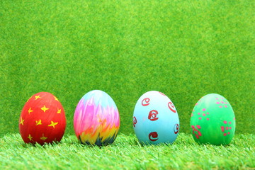Easter eggs on grass background