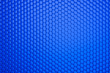Honeycomb grid against blue background