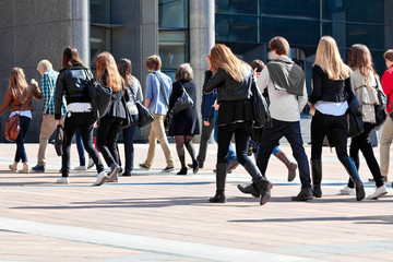 Group of young people walking.