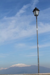 lamppost in blue sky