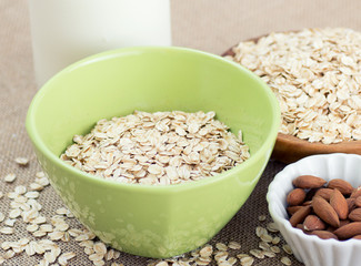Bowl of oatmeal with almonds and milk