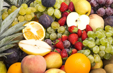 background of ripe fruit apples oranges grapes