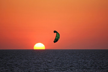 kitesurfer at sunset