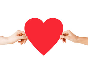 couple hands holding red heart