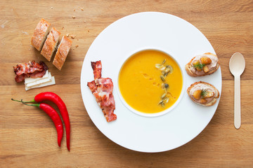 Pumpkin puree soup with extras