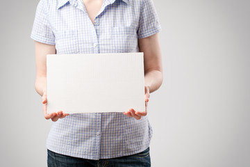 Woman Holding an Empty Sign