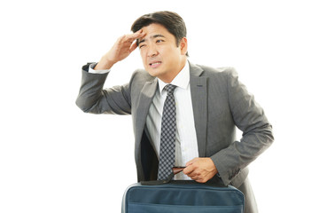 頭痛を訴えるビジネスマン