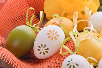 easter eggs with dots and yellow spring flower decoration