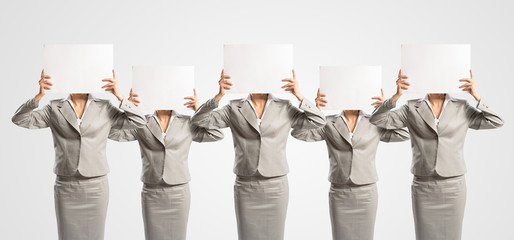 image of a businesswomen standing in a row