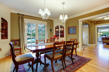 Elegant furnished dining room with wooden rustic dining table se