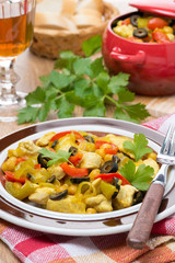 delicious chicken stew with chickpeas, peppers and onions
