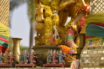 Fototapeta premium Ritual figurines on Buddhist altar, Thailand