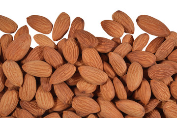 Heap of peeled almonds on a white