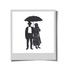 Photo-frame with silhouettes old-fashioned women and man