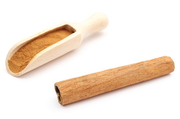 Powdery and stack of cinnamon stick on white background