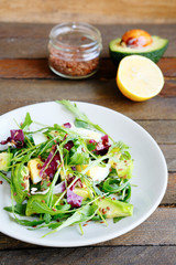 crispy salad with avocado and egg