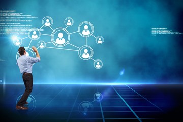 Composite image of businessman posing with arms up