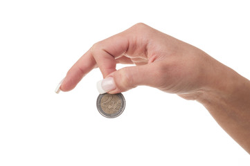 Plakat Detail of woman hand holding euro coin on white background.