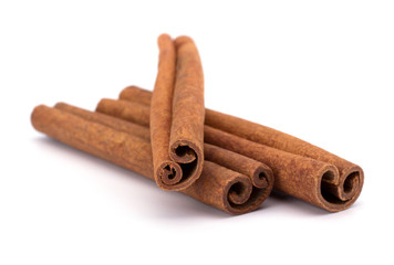 Cinnamon sticks isolated on white background