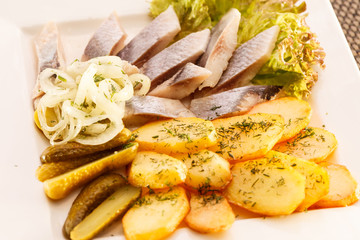 herring slice with boiled potato