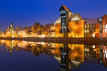 Old town of Gdansk with ancient crane at night, Poland