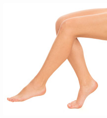 Woman's legs on white background