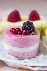 Pink cake with mousse from berries, diet dessert