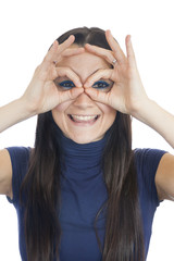 Smiling Woman Makes Finger Glasses