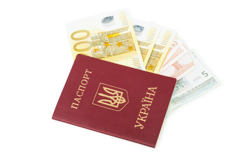 Ukrainian foreign passport with euro banknotes