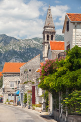 Fototapeta na wymiar Main coastal street of Perast town. Bay of Kotor, Montenegro