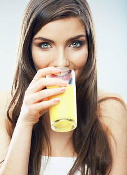 Young woman close up portrait drink juice