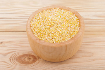 Wheat cereal in a bowl on the table.