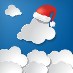 Clouds With Red Santa Claus Hat on a Blue Background