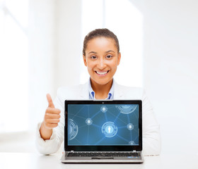 smiling woman with laptop computer