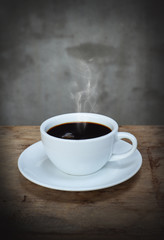 Cup of coffee on old wood table,still life