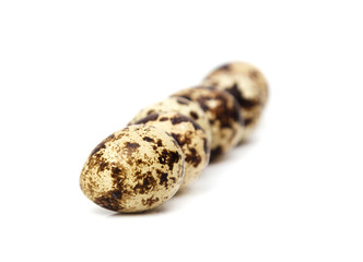quail eggs on a white background. macro