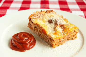Portion of tasty lasagna on a plate