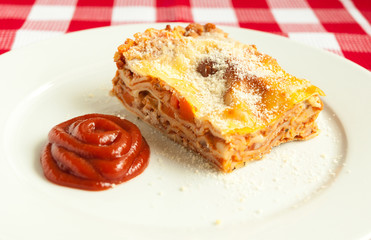 Portion of tasty lasagna on a plate
