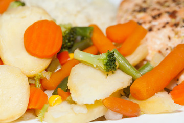 The healthy diet. The salmon with vegetables