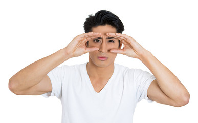 Fototapeta premium Curious man peeking, monitoring situation, white background