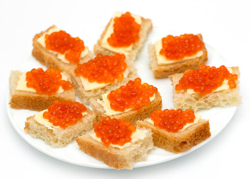 red caviar on bread with butter