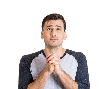 Man praying, asking better life, forgiveness for mistakes done