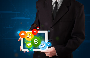 Businessman presenting colorful modern signs