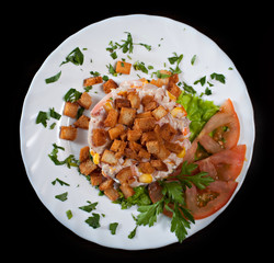 Delicious salad with vegetables and croutons