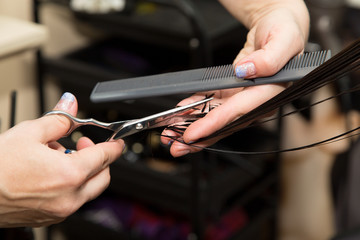 Women's haircut scissors at salon